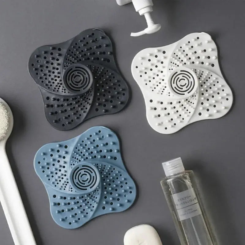 Drain Hair Catcher with Spiral Ridges and Suction Cup Anchors, Lift  Handle