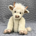 Handcrafted Highland Cow with Floral Crown Figurine